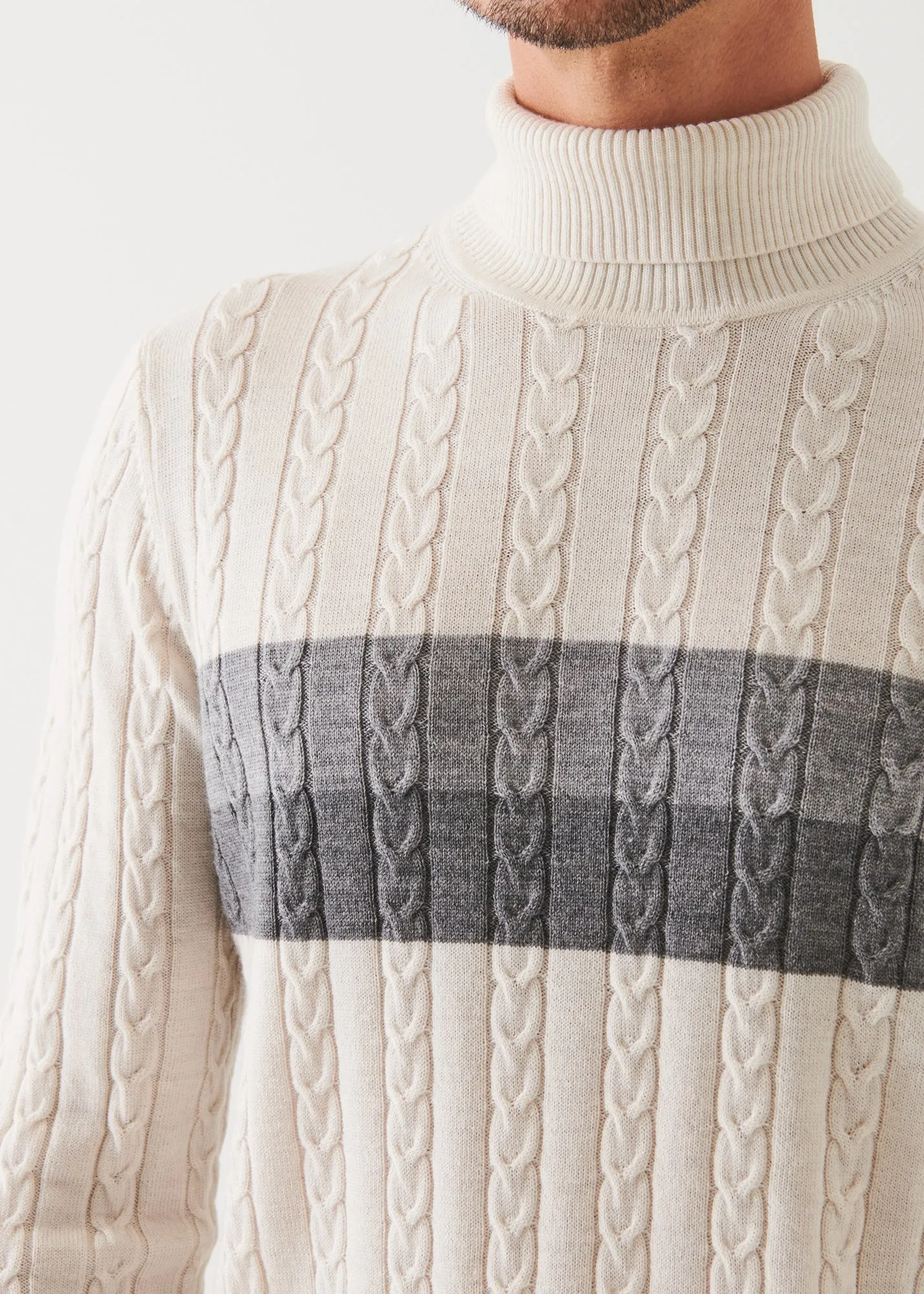 MERINO STRIPED CABLE KNIT TURTLENECK