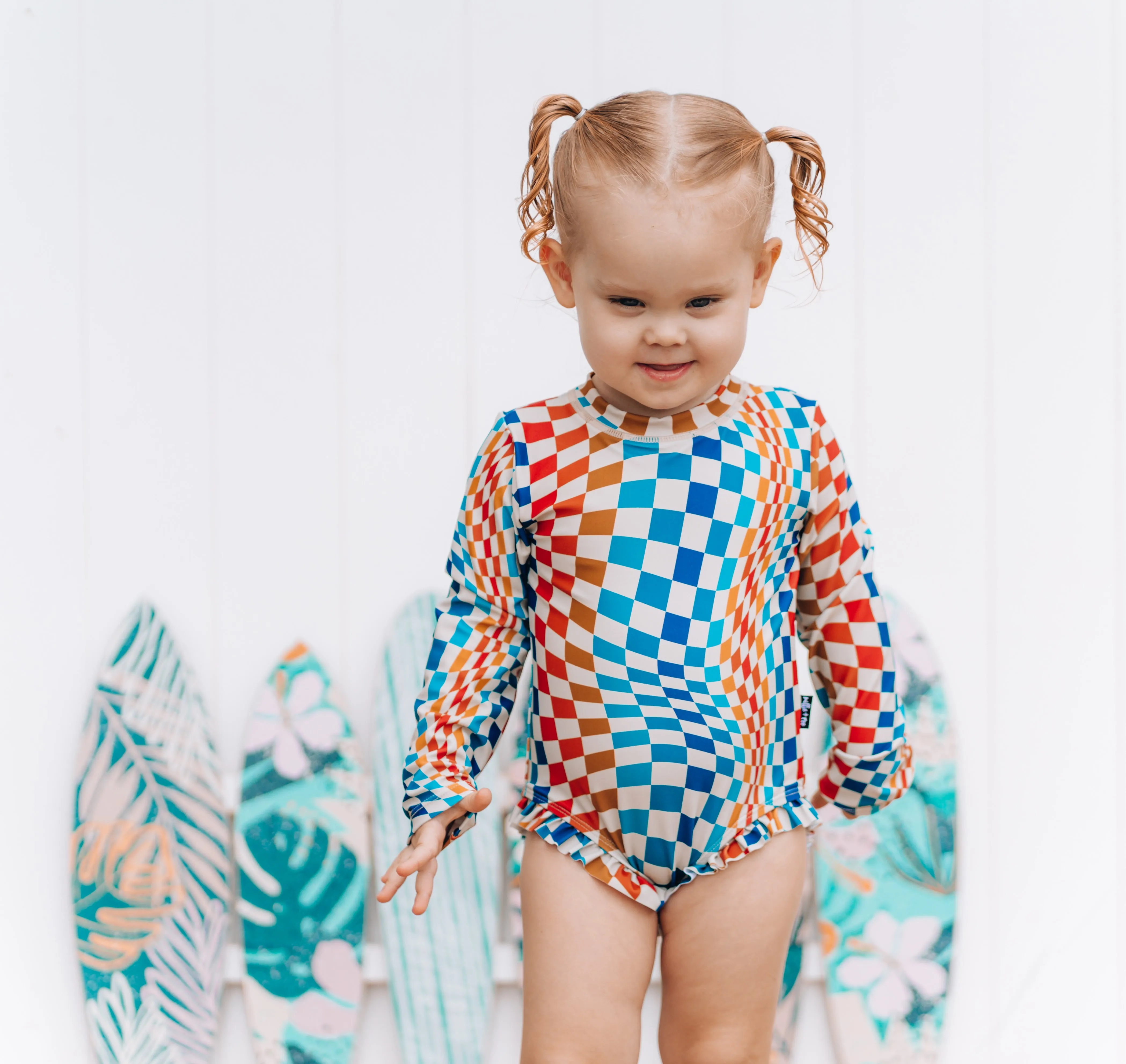 RUFFLE RASH GUARD- Groovy Check